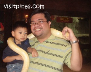 Wrapped in albino snake at Ark Avilon Zoo