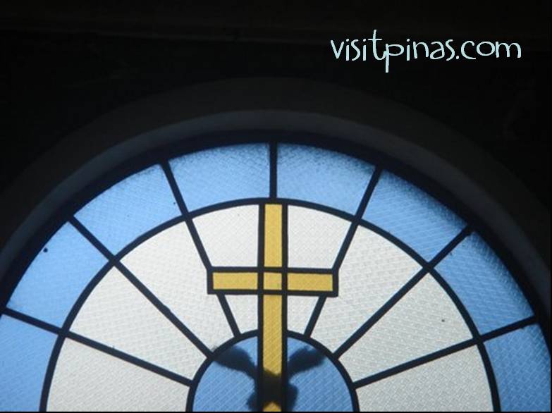 Stained glass cross at Sta. Ana Church, Manila City