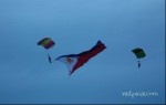 Parachute jumpers with flag at the Philippine International Hot Air Balloon Fiesta, Clarkfield