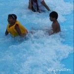 Playing at the wave pool, Amana Waterpark