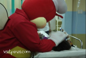 Jollibee comforting kid in hospital