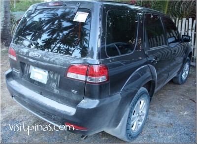 Sand-coated Ford Escape in Laiya, Batangas