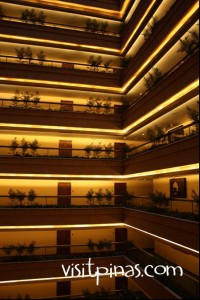 Rooms surrounding the center space at Discovery Suites, Ortigas