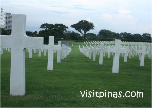 Neatly arranged headstones at Manila American Cemetery