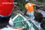 Boatman slides while Shooting the Rapids in Pagsanjan Falls, Laguna