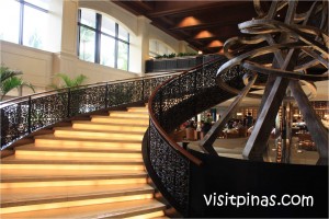 Bottom view of spiral staircase at Sofitel Philippine Plaza