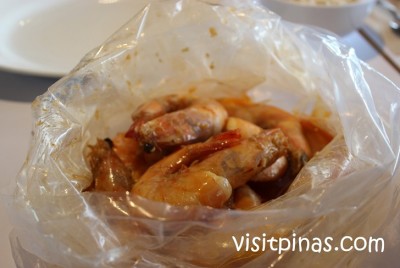 Dish served in clear plastic at Shrimp Bucket Restaurant