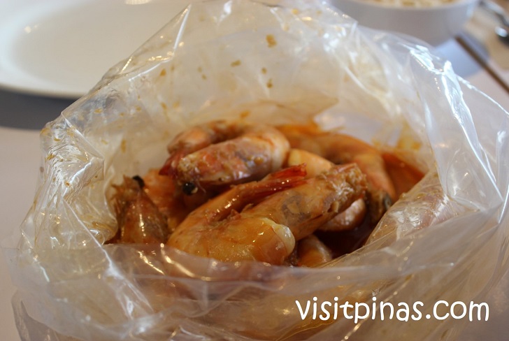 Dish served in clear plastic at Shrimp Bucket Restaurant