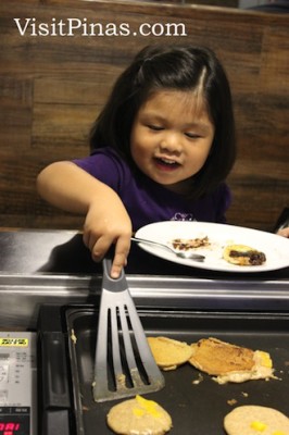 Kids love flipping pancakes at Slappy Cakes