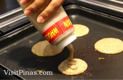 Pouring the batter into the cooking surface