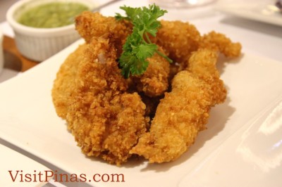 Breaded Fish Filet with Wansoy Sauce at Wooden Spoon
