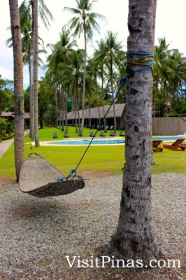 Relax in a hammock at Bahay Bakasyunan sa Camiguin