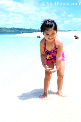Testing the white sand in Canigao Island, Leyte