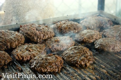 Burger Patties on the Grill at Snack Shack