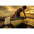 Boatman and sunset by earlmasangkay