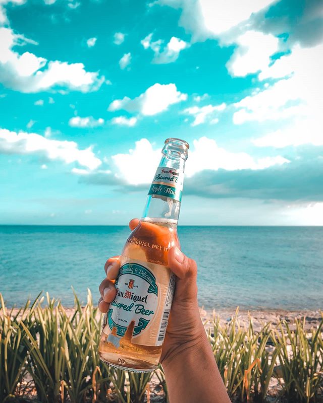 Beach, beer and blue skies.